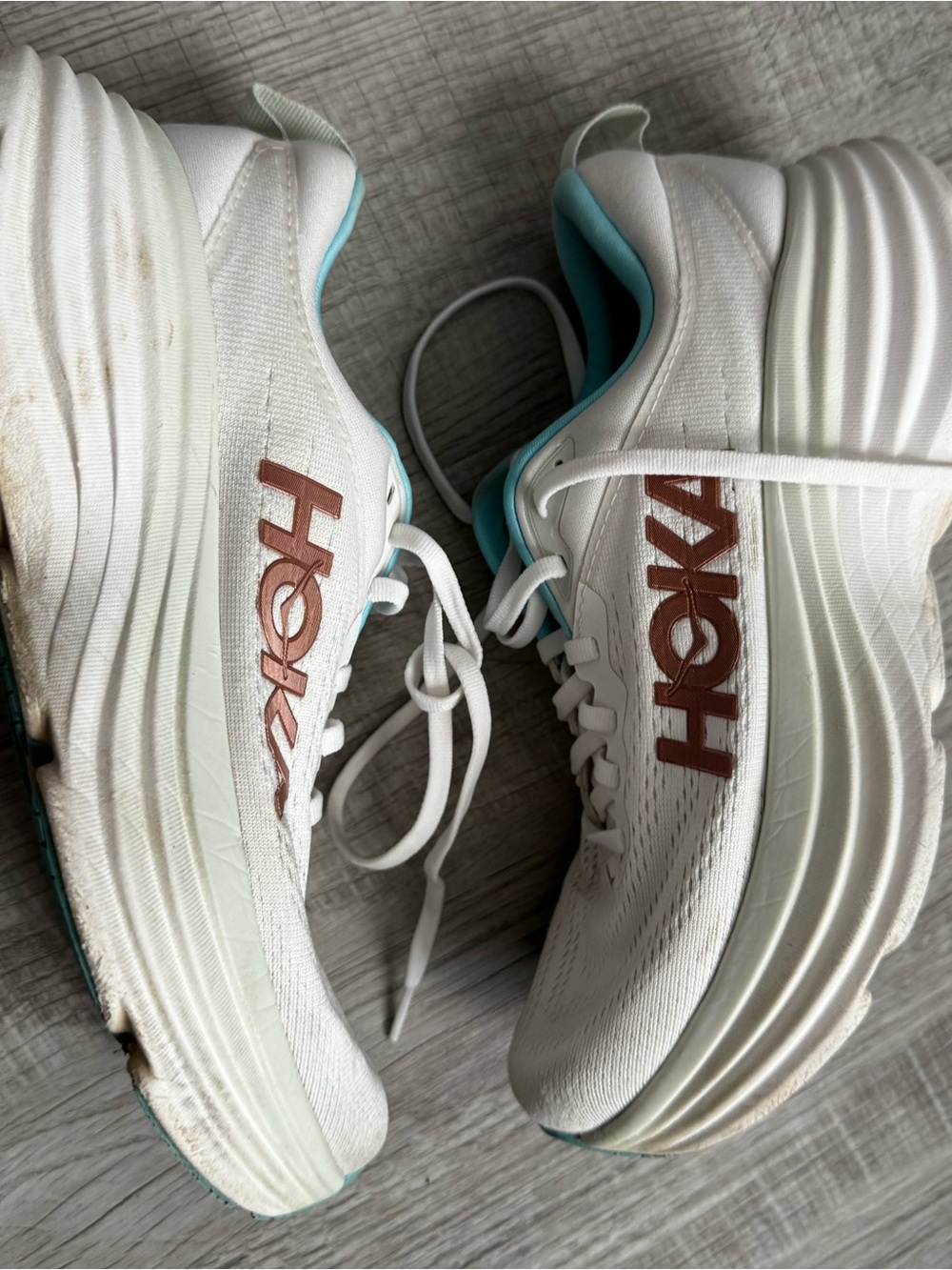 Hoka women’s White Sneakers with Brown Logo and Teal Accent